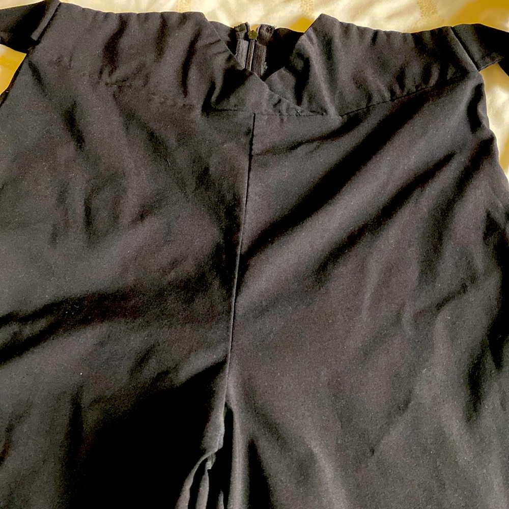 Black straight legged dress pants.